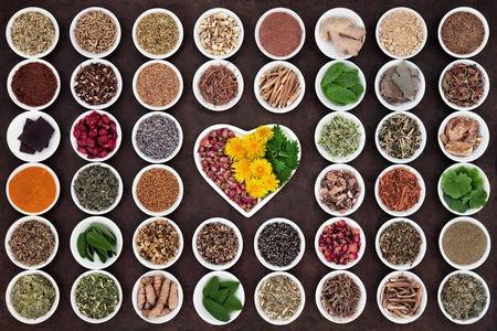 51238297-herbal-medicine-selection-used-for-womans-health-in-heart-and-round-shaped-porcelain-bowls-over-lokt